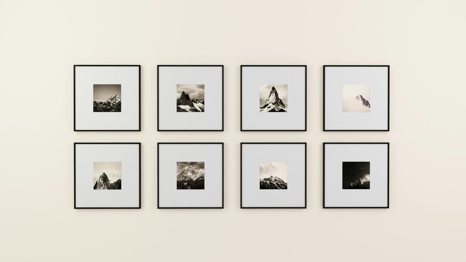 Black and white mountain framed photos on a wall